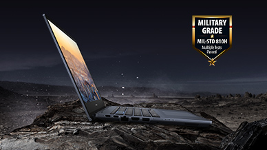 图片中有一部 ASUS ExpertBook 笔记本电脑放置于岩石上，以及展示笔记本电脑耐用性的 MIL-STD 810H 标志。